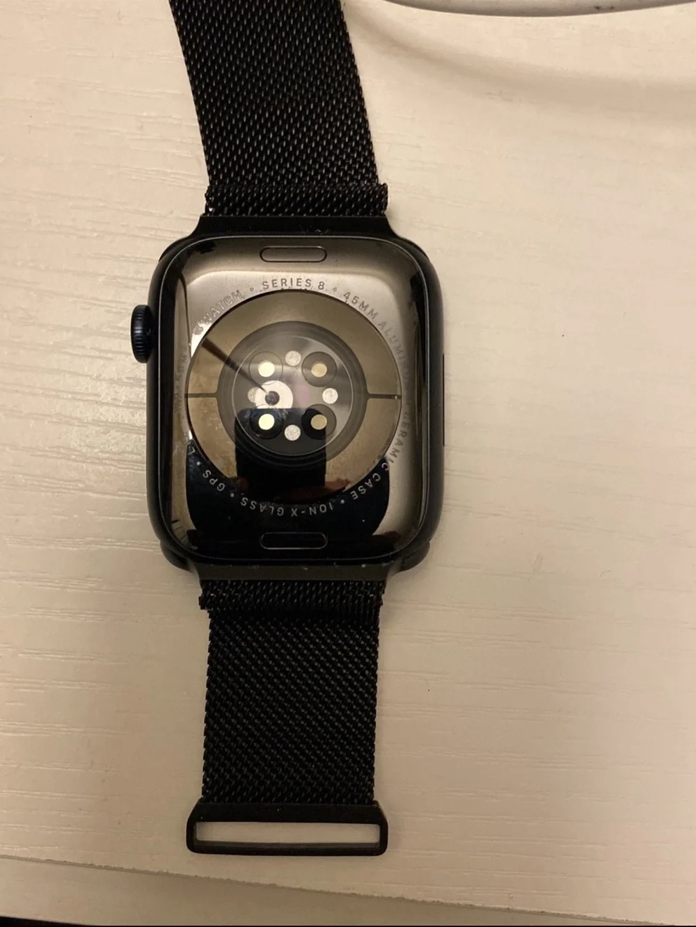 Apple Black Smartwatch with White Magnetic Charger